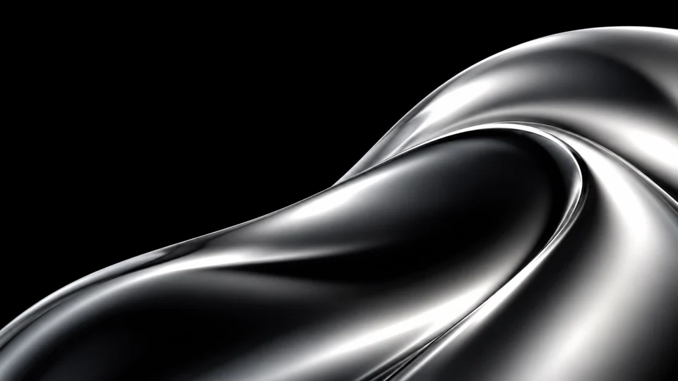 Smooth liquid-silver folds catching bright studio reflections